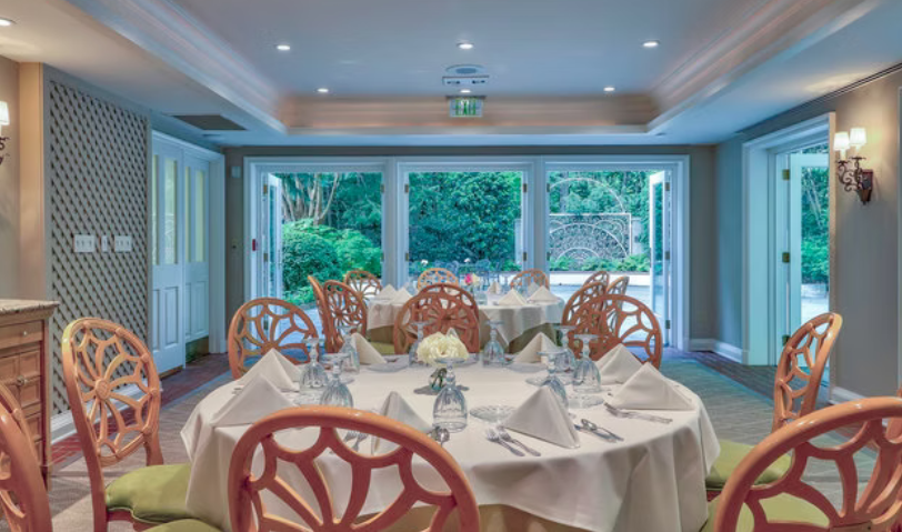 The BelleNita Room with French doors open to the garden